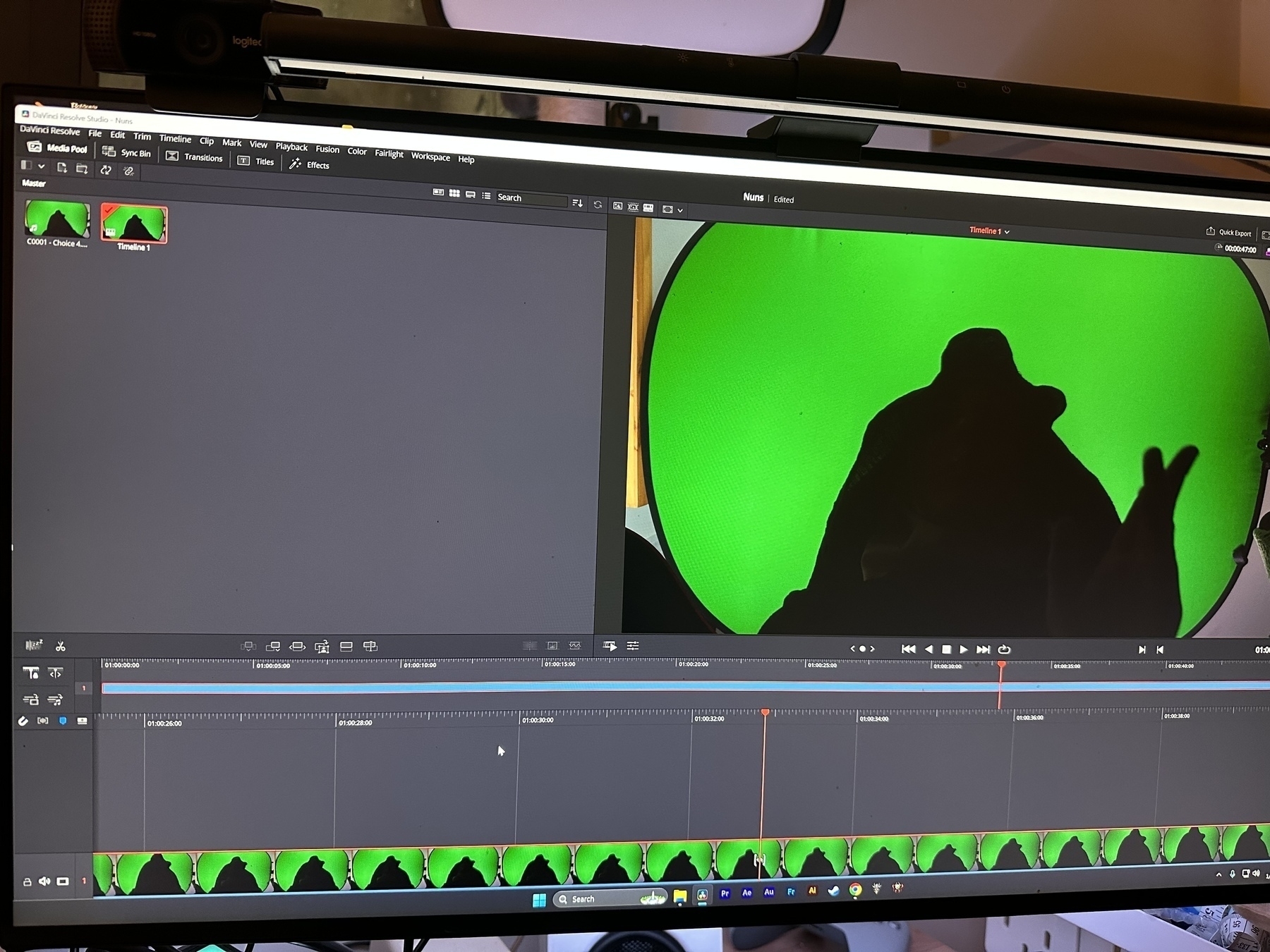 Photo of a timeline in DaVinci with green screen footage